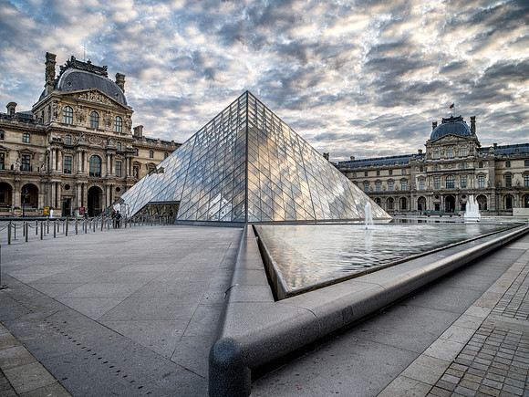 The Louvre with clouds